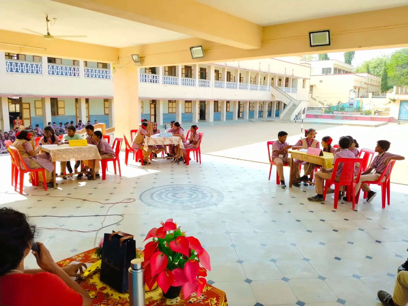 Students participating in a quiz competition at St. Joseph's High School